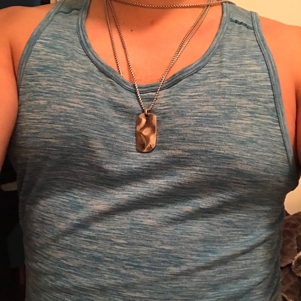 Men’s sterling silver chain with pendant.